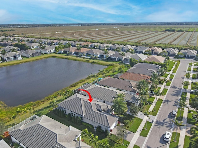 bird's eye view featuring a rural view and a water view