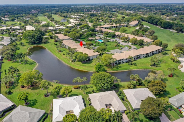 birds eye view of property featuring a water view and a residential view