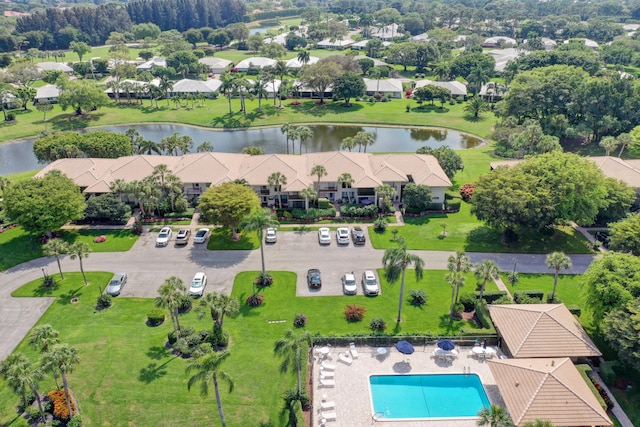 birds eye view of property featuring a water view