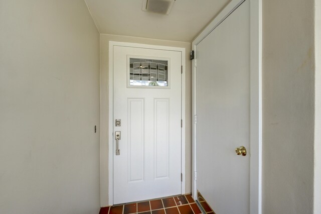 living room with ornamental molding and light hardwood / wood-style floors