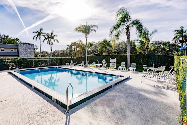 view of swimming pool featuring a patio