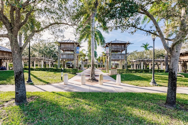 view of community featuring a yard