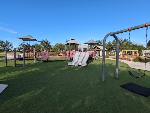 community playground featuring a yard