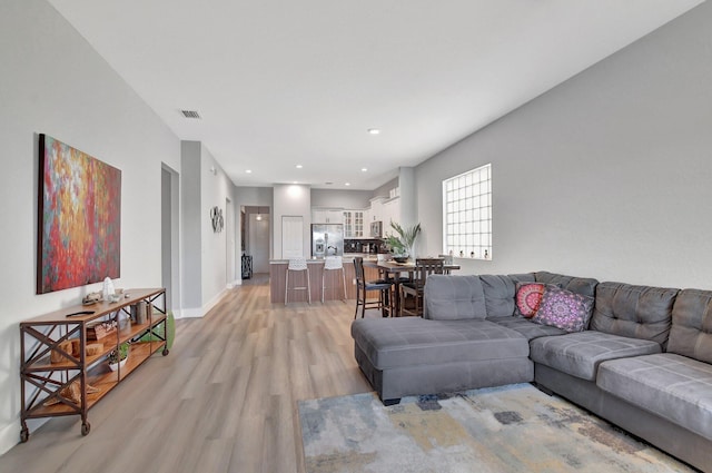 living room with light wood-type flooring