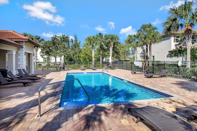 view of swimming pool featuring a patio