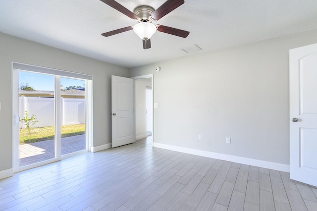 unfurnished room featuring ceiling fan