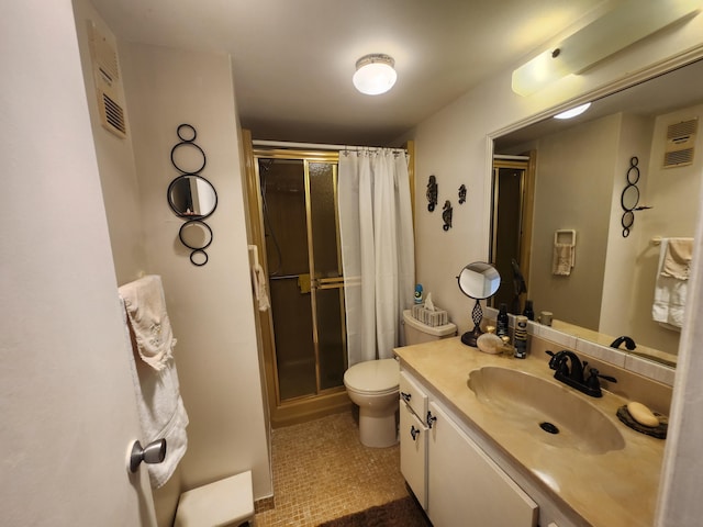 bathroom with tile patterned floors, vanity, toilet, and walk in shower