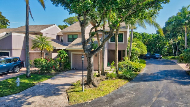 view of front of home with a garage