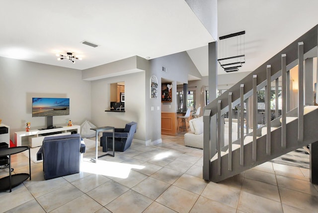 tiled living room featuring a healthy amount of sunlight