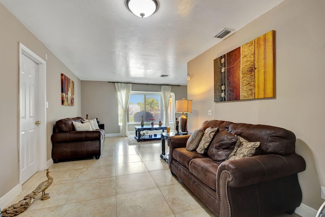 living room with light tile patterned floors