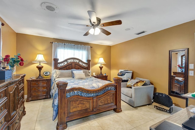 bedroom with ceiling fan and light tile patterned flooring