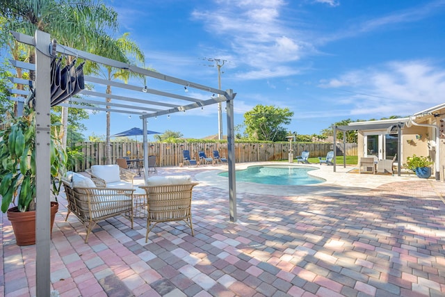 view of pool featuring outdoor lounge area, a patio area, and a pergola