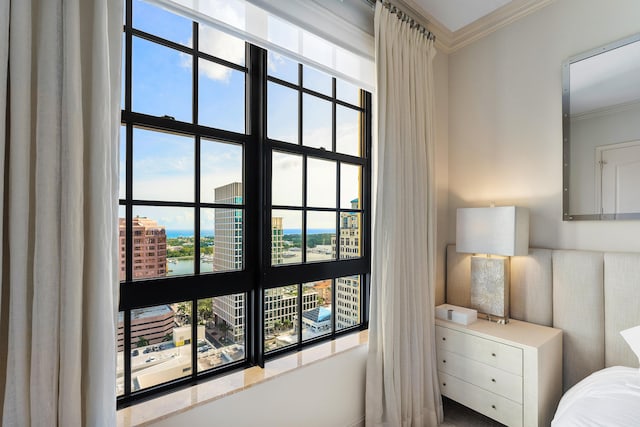 bedroom with crown molding