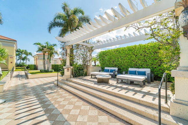 view of patio featuring an outdoor hangout area and a pergola