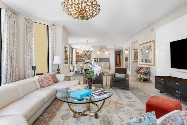 tiled living room featuring ornamental molding and a notable chandelier