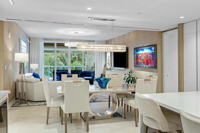 dining area featuring a chandelier