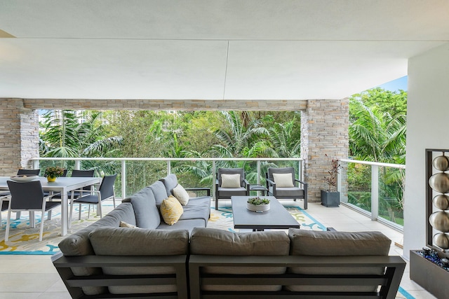 exterior space with outdoor lounge area and a balcony