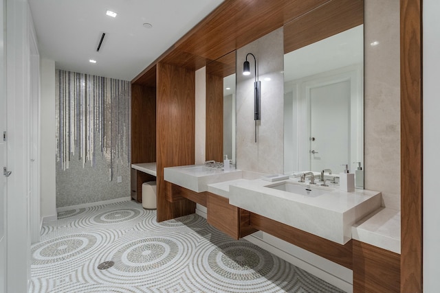 bathroom with vanity and tile patterned flooring