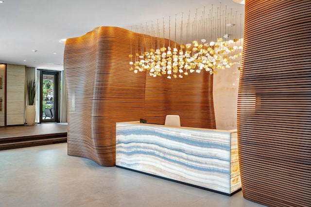 welcome area with a chandelier