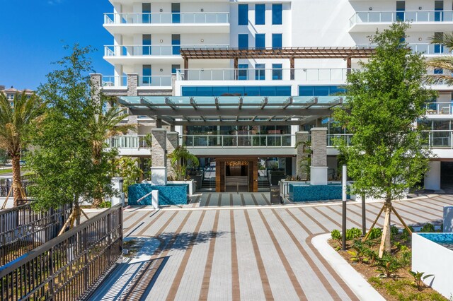 exterior space featuring a pergola