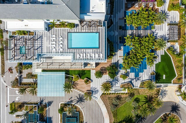 birds eye view of property with a water view