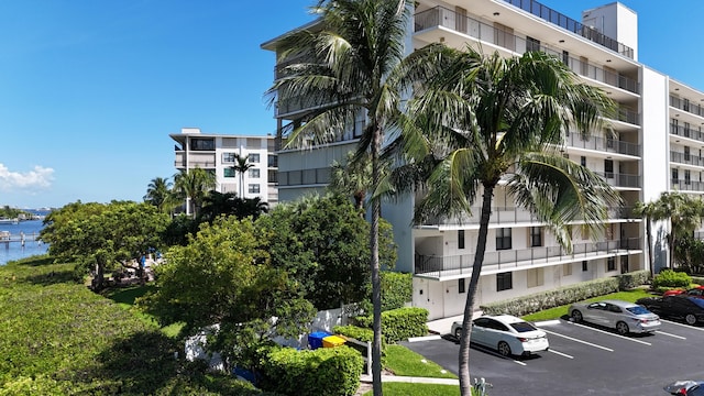 view of building exterior with a water view