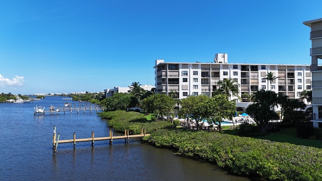 property view of water with a dock