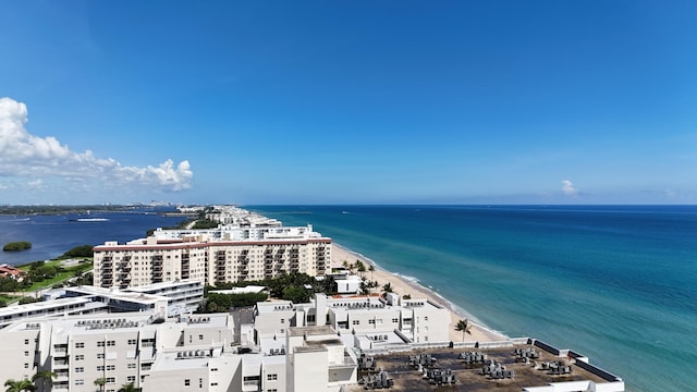 bird's eye view featuring a beach view and a water view