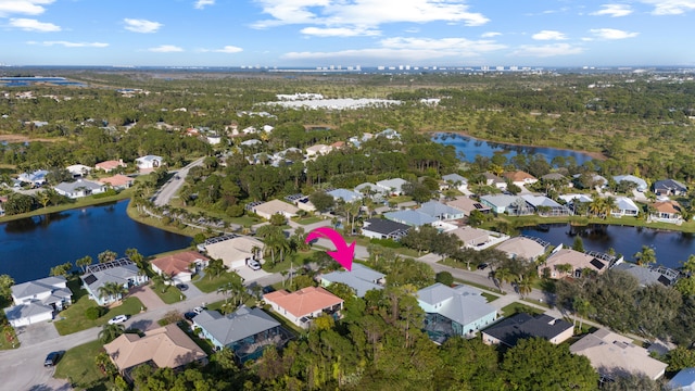 drone / aerial view featuring a water view