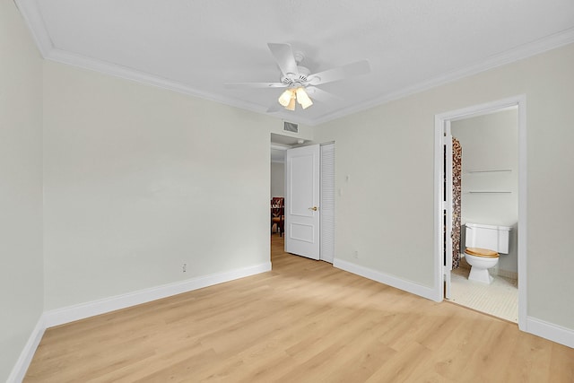 unfurnished bedroom featuring connected bathroom, ceiling fan, light hardwood / wood-style flooring, and ornamental molding