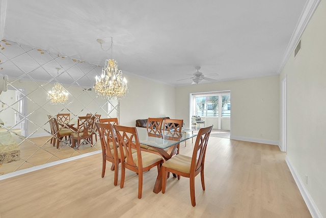 dining room featuring light hardwood / wood-style flooring, ceiling fan with notable chandelier, and ornamental molding