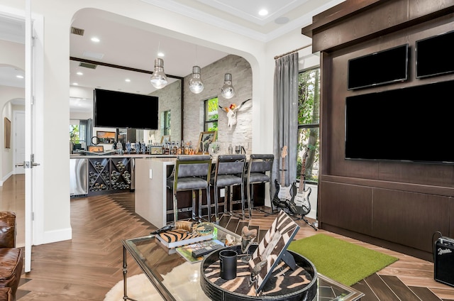 living room with french doors, dark parquet floors, and ornamental molding