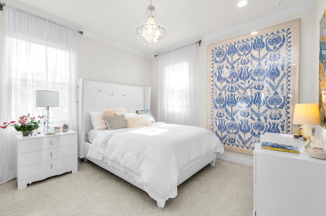 carpeted bedroom featuring crown molding