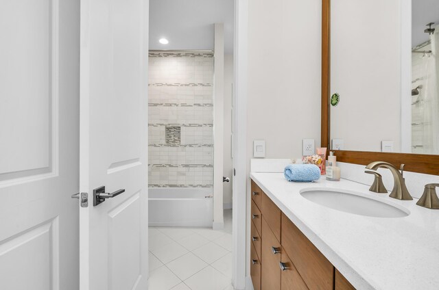 tiled bedroom featuring ensuite bathroom and ornamental molding