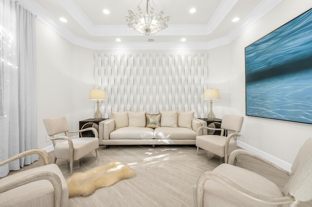 interior space with a raised ceiling, crown molding, and a chandelier