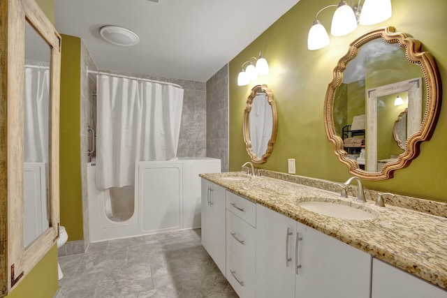 bathroom featuring shower / bathtub combination with curtain and vanity