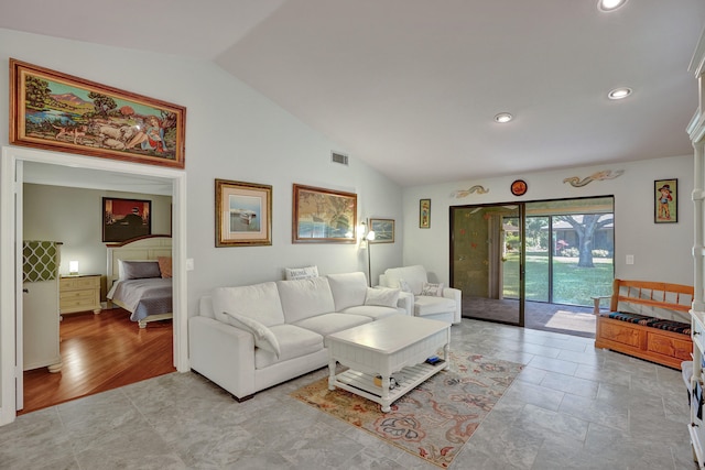 living room with vaulted ceiling