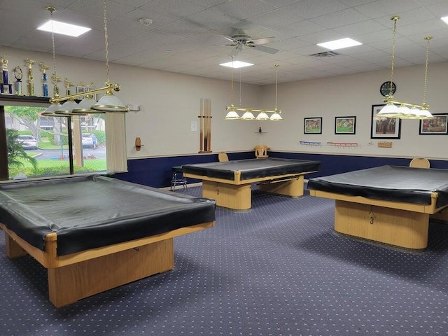 recreation room with pool table, a drop ceiling, and ceiling fan