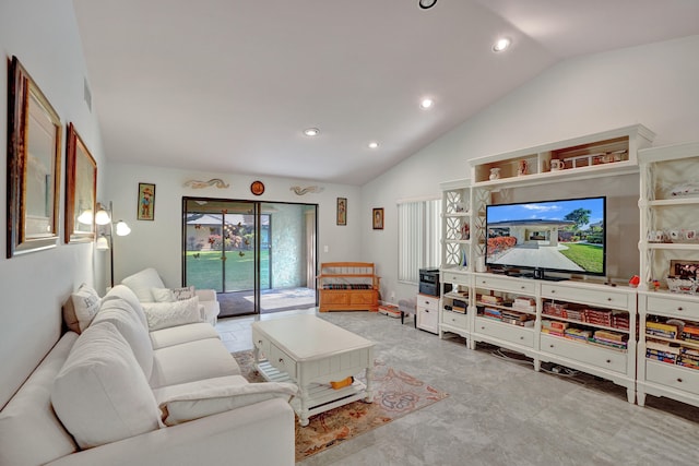 living room featuring lofted ceiling