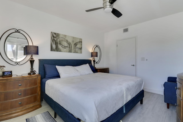 bedroom featuring light hardwood / wood-style flooring and ceiling fan