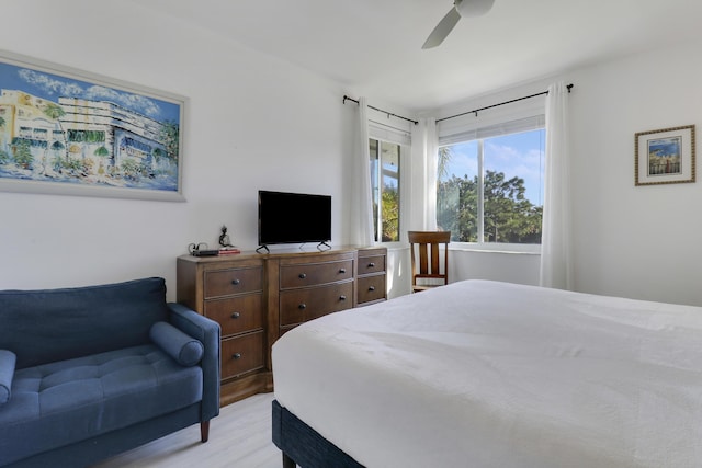 bedroom featuring ceiling fan and light hardwood / wood-style floors