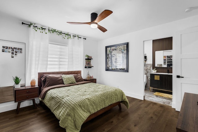 bedroom with dark hardwood / wood-style flooring and ceiling fan