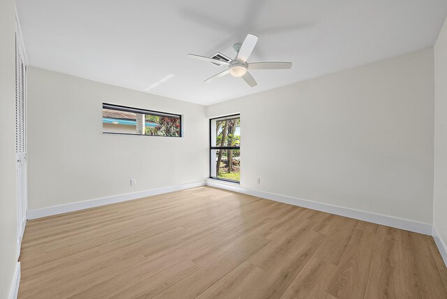 unfurnished living room featuring sink