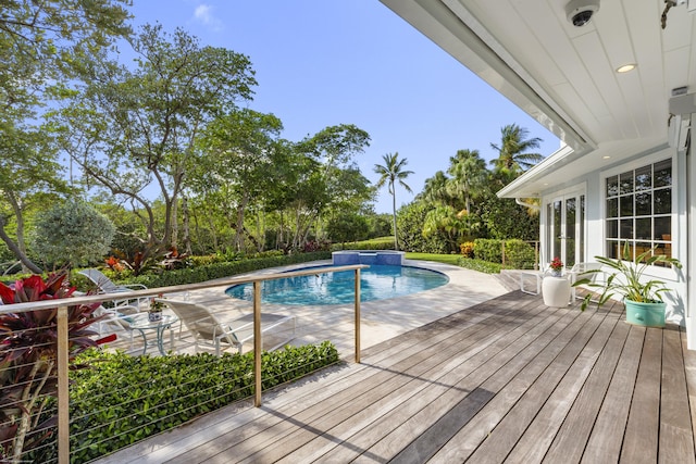 view of swimming pool featuring pool water feature