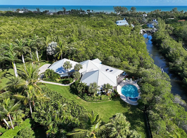 birds eye view of property featuring a water view