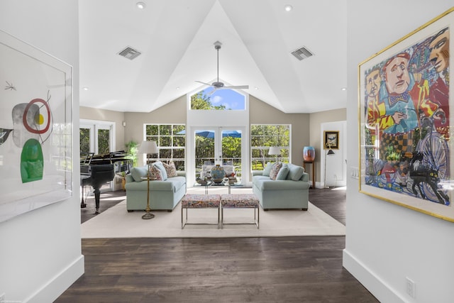 living room featuring dark hardwood / wood-style floors, ceiling fan, a wealth of natural light, and french doors