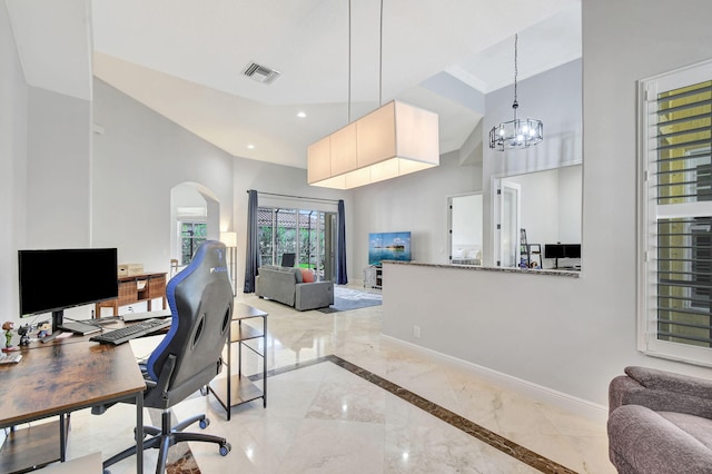 office area with a chandelier