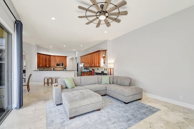 living room featuring ceiling fan