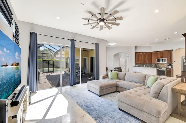 living room featuring ceiling fan