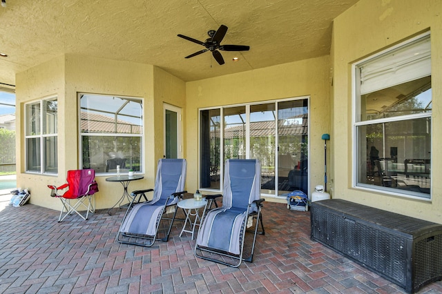 view of patio with ceiling fan